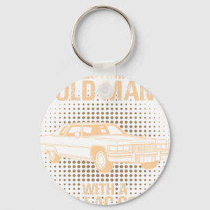 An Old Man Cadillac Coupe De Ville Keychain