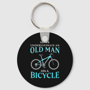 An Old Man On A Bicycle Keychain