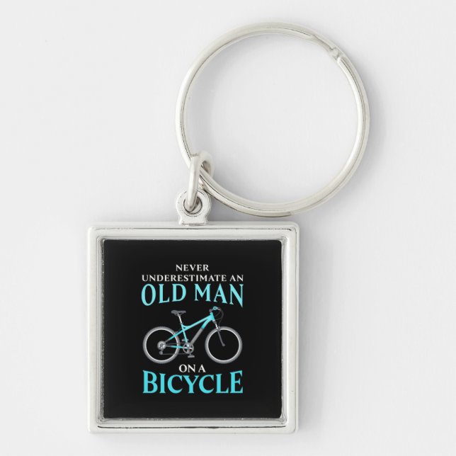 An Old Man On A Bicycle Keychain (Front)