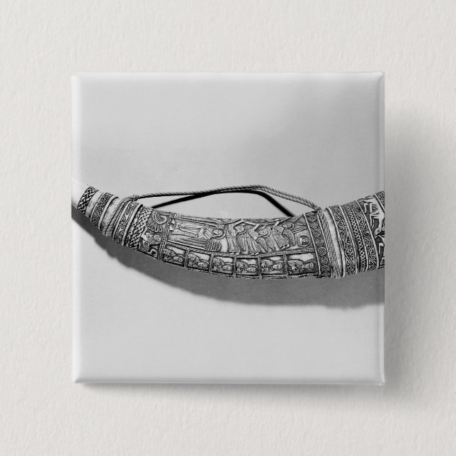 An oliphant 2 inch square button (Front)