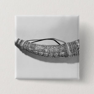 An oliphant 2 inch square button