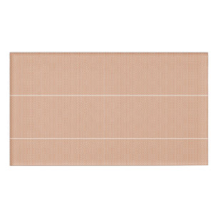 an orange and white geometric pattern name tag