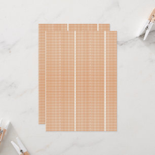 an orange and white pattern on a white background invitation