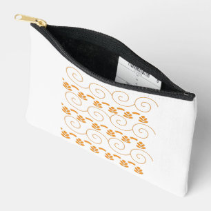 an orange and white pattern with swirls on it accessory pouch