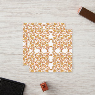 an orange and white wallpaper with a floral design loyalty card