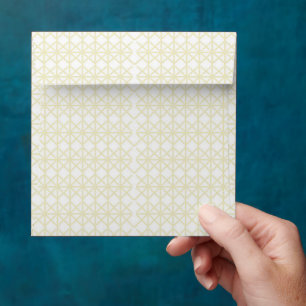 an orange and yellow background with small dots envelope