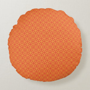 an orange and yellow background with small squares round pillow