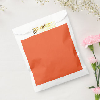 an orange background with a favour bag