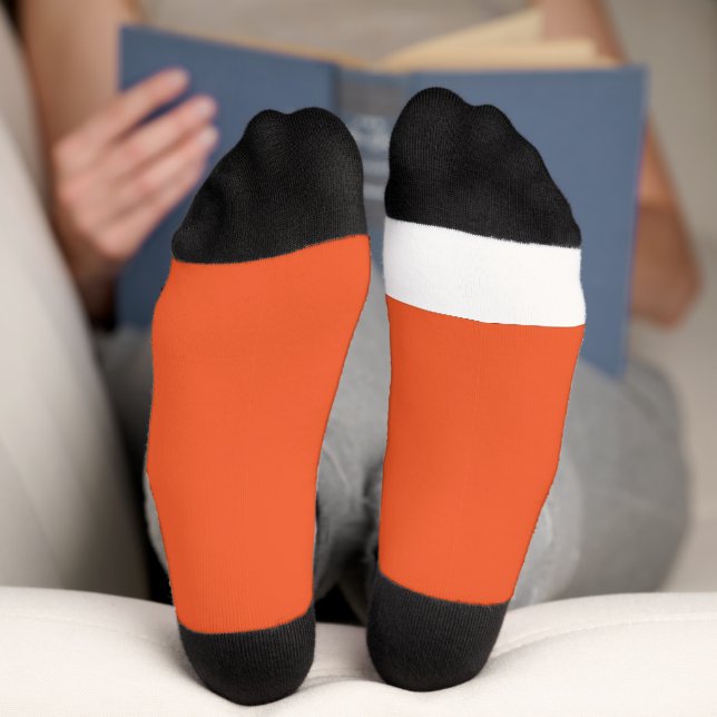 an orange background with a socks (Bottom)