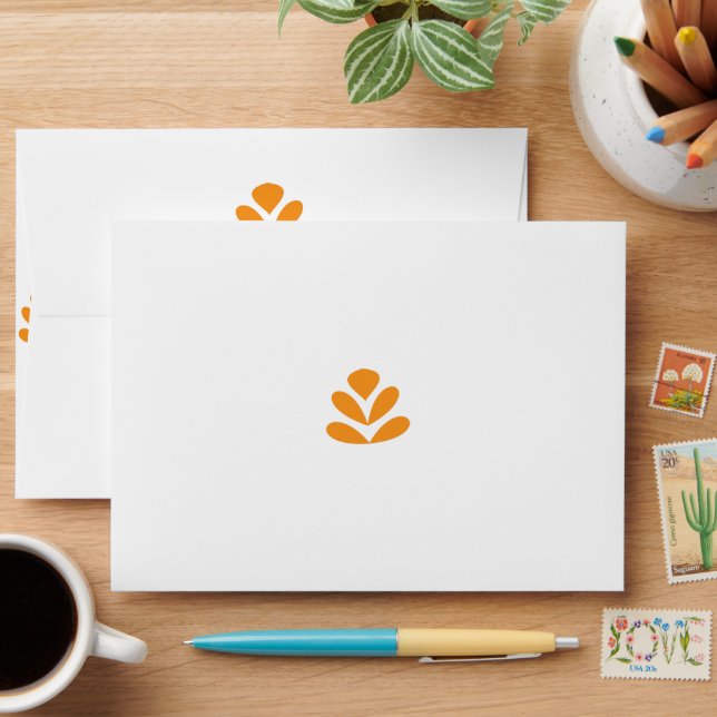 an orange flower on a white background envelope (Desk)