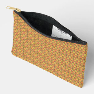 An orange, yellow, and brown symmetrical pattern w accessory pouch