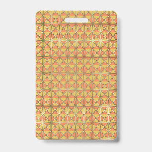 An orange, yellow, and brown symmetrical pattern w badge