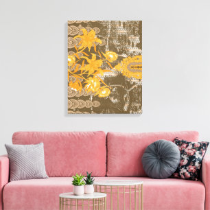 An ornate floral and leaf motif on a brown backgro canvas print