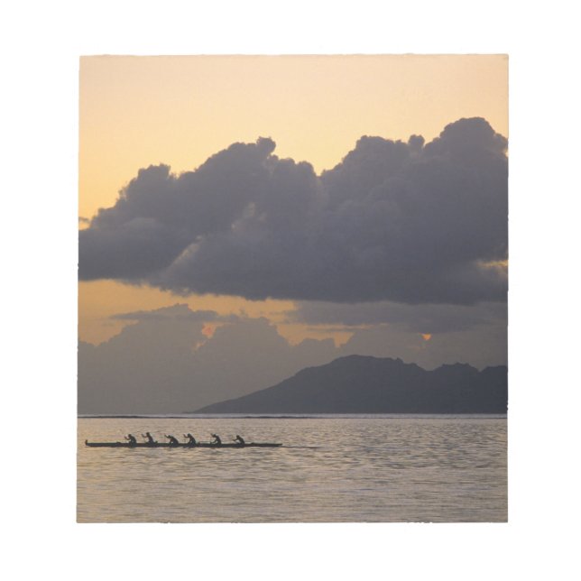 An outrigger canoe team practices off the coast notepad (Front)