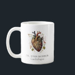 Anatomical Heart Cardiologist Doctor  Coffee Mug<br><div class="desc">An artistic cardiology clinic,  cardiologist's office mug. For employees or patients. However,  this heart is not just a clinical representation; it's adorned with vibrant greenery sprouting from its chambers and arteries. Delicate vines and leaves intertwine with the cardiac structures,  symbolizing life,  growth,  and the importance of nurturing heart health.</div>