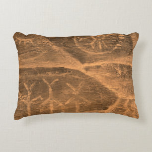 ancient design on the cave wall. history of antiqu accent pillow