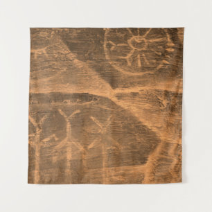 ancient design on the cave wall. history of antiqu tapestry