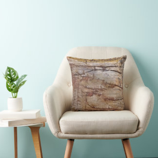Ancient rock art in earthy tones throw pillow