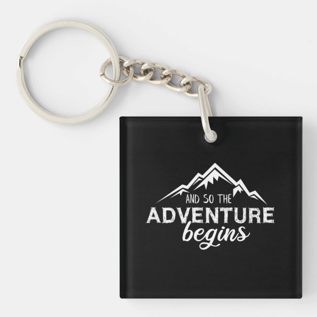 and so the adventures beigns keychain (Front)
