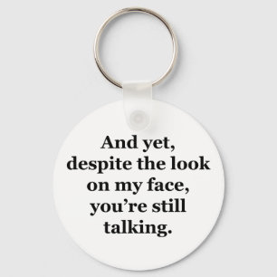 And Yet, Despite the Look on my Face Keychain