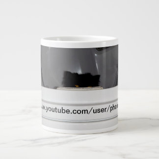 Andy the Persian cat likes to sleep in the dryer.. Large Coffee Mug