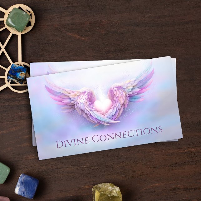 Angel wings gently embracing the heart business card (Creator Uploaded)