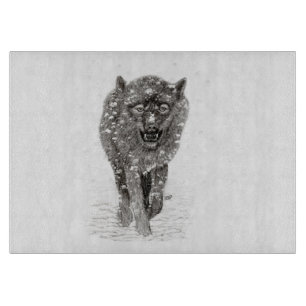 Angry Black Wolf in the Snow , wild Winter Cutting Board
