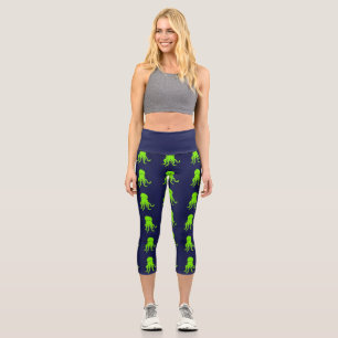 Angry green octopus on blue capri leggings
