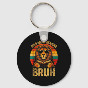 Animal print clothes wild about reading bruh kids keychain