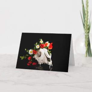 Animal skull with a wreath of wild flower holiday card