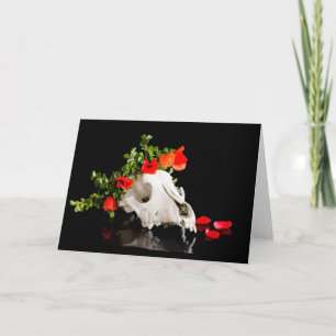 Animal skull with a wreath of wild flower holiday card