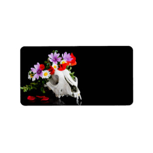 Animal skull with a wreath of wild flower label