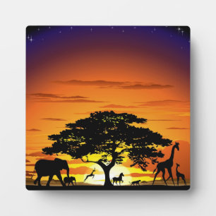 Animaux sauvages sur la Plaque couché de soleil de