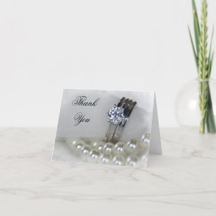 Anneaux de diamant et perles blanches Merci Mariag