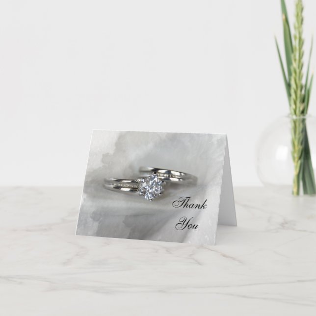 Anneaux mariages sur Merci gris (Devant)