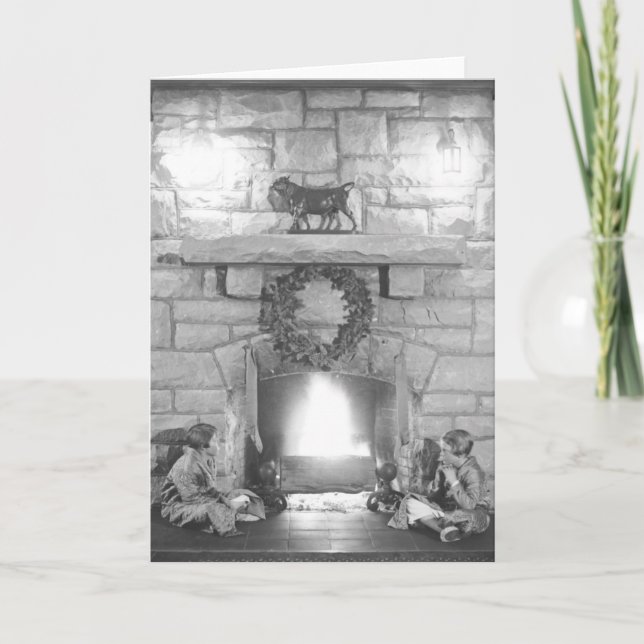 Annice and Margot Belden sitting by a fireplace at Holiday Card (Front)