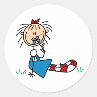 Annie Lying In Grass With Flower Sticker