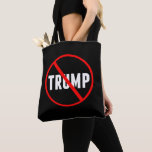 Anti Trump Bold Red Strikethrough Black Tote Bag<br><div class="desc">Trump with a red circle and an X over his name. Carry this tote bag around to get Americans to resist and impeach Trump. Show you hate Trump. Great for all Americans against Donald Trump,  Democrats and Republicans.</div>