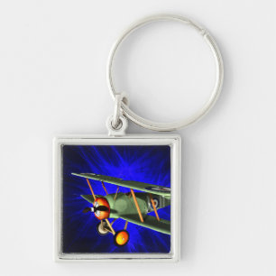 Antique airplane on blue keychain