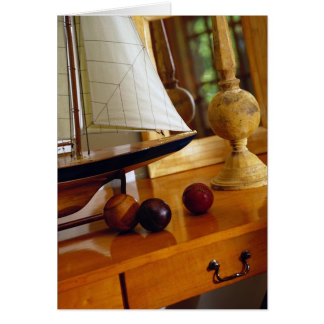 Antique Baseballs On A Table By A Model Sailboat (Front)