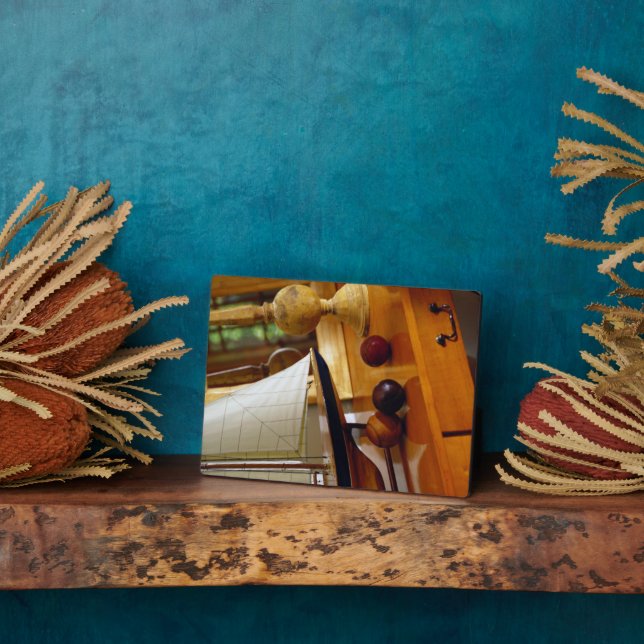 Antique Baseballs On A Table By A Model Sailboat Plaque (Side)