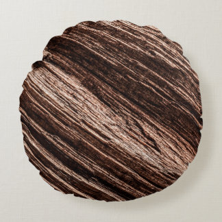 Antique brown obsolete wooden background. age-old, round pillow