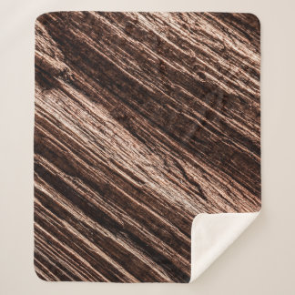 Antique brown obsolete wooden background. age-old, sherpa blanket