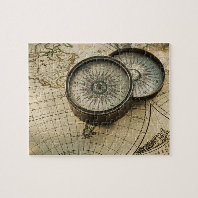 Antique compass on map jigsaw puzzle (Horizontal)