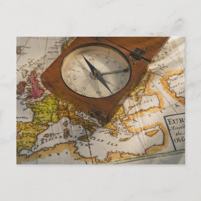 Antique compass on map postcard (Front)