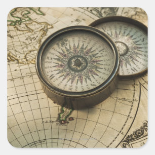 Antique compass on map square sticker