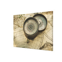 Antique compass on map stretched canvas prints