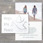 Any Text Holiday Dove Peace Hope Joy Modern Photo Foil Card<br><div class="desc">Send family and friends an elegant bird of peace bearing a message of holiday hope and better days to come. This elegant silver real foil folded card shares joyful holiday greetings and one of your favourite photos. All text on this template is simple to customize to include any wording, making...</div>