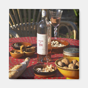 Aperitif and appetizers prepared: bread, olives, magnet