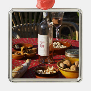 Aperitif and appetizers prepared: bread, olives, metal ornament